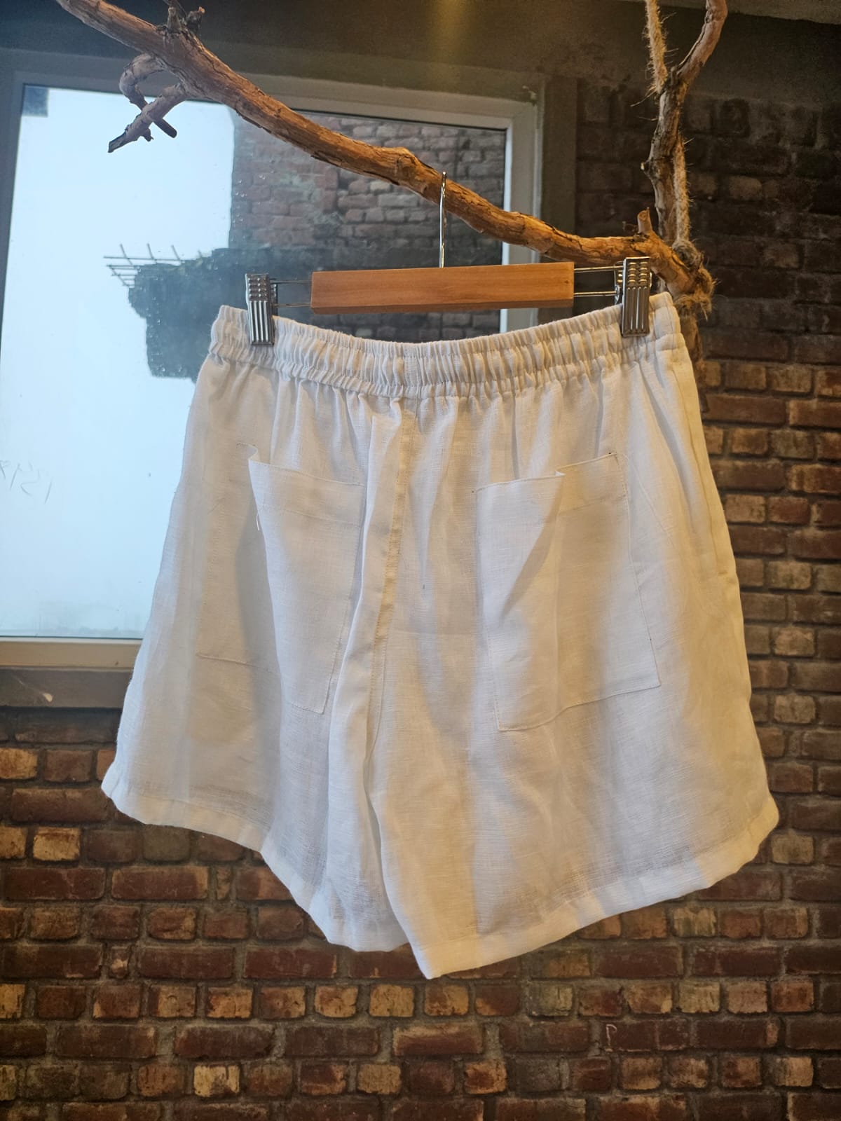 Hand embroidered linen mini grocery shorts