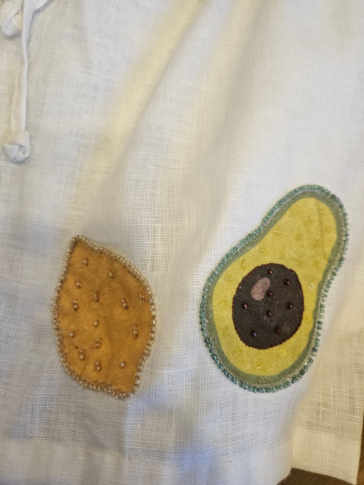 Hand embroidered linen mini grocery shorts