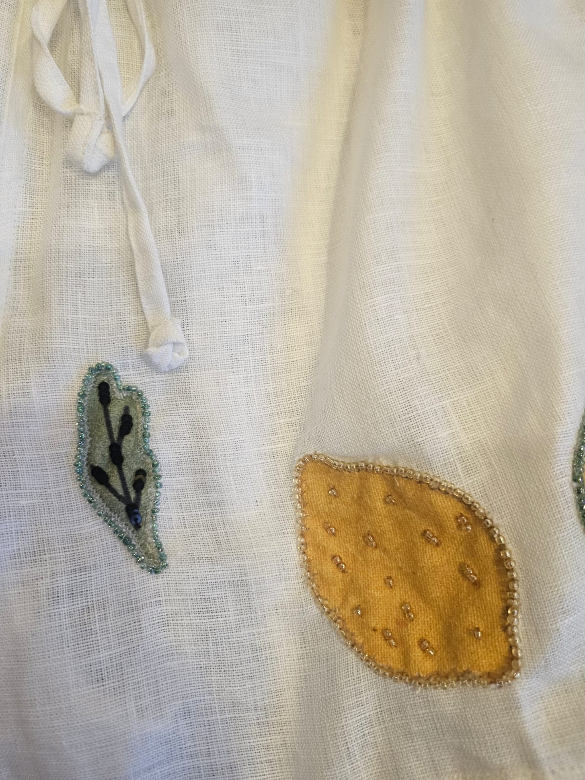 Hand embroidered linen mini grocery shorts