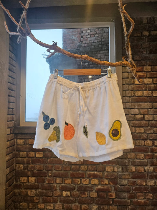 Hand embroidered linen mini grocery shorts