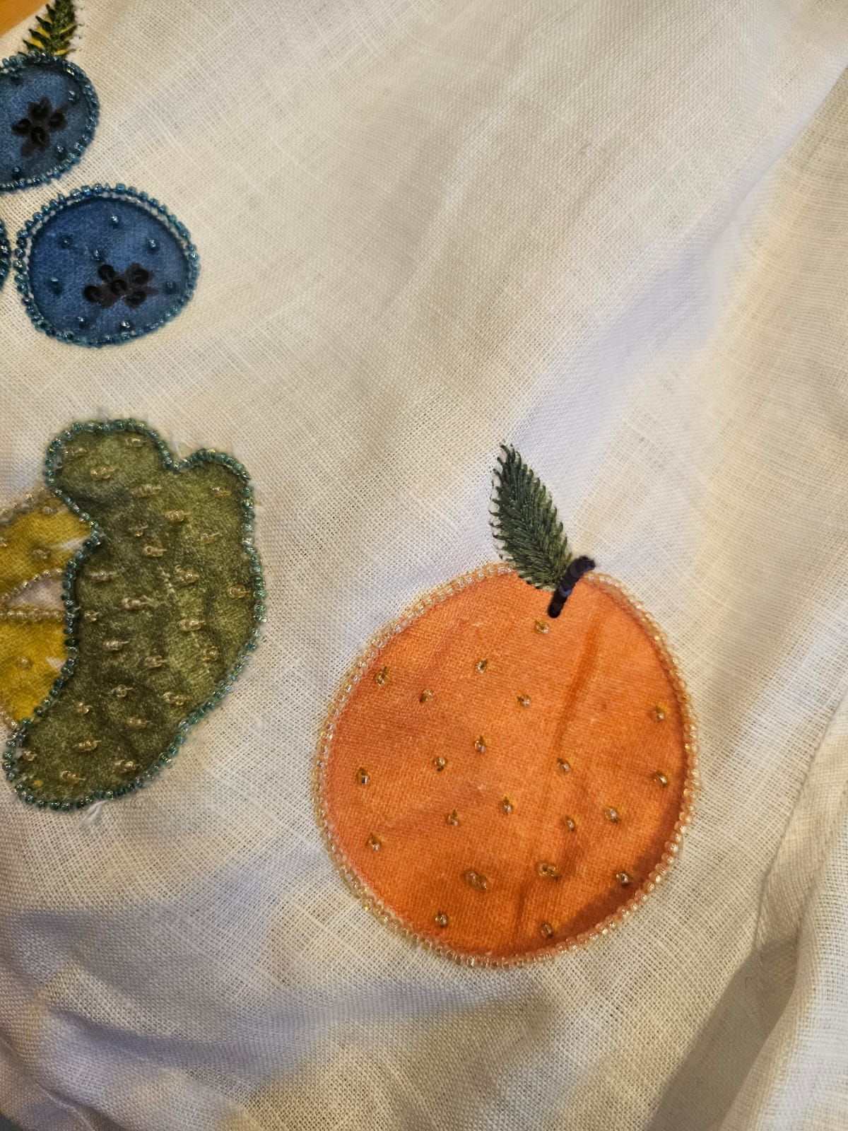 Hand embroidered linen mini grocery shorts